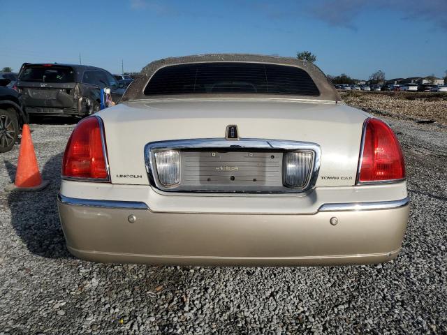 Photo 6 from auction – 2004 LINCOLN TOWN CAR E with VIN 1LNHM81W44Y660313