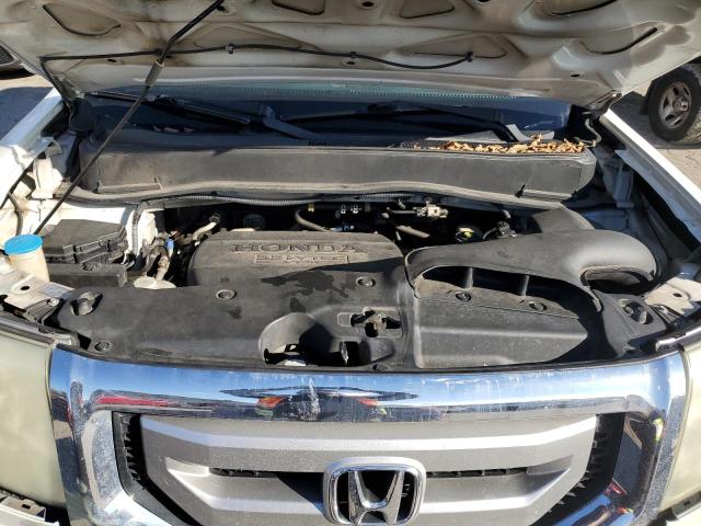 Photo 12 from auction – 2011 HONDA PILOT TOUR with VIN 5FNYF3H99BB021200