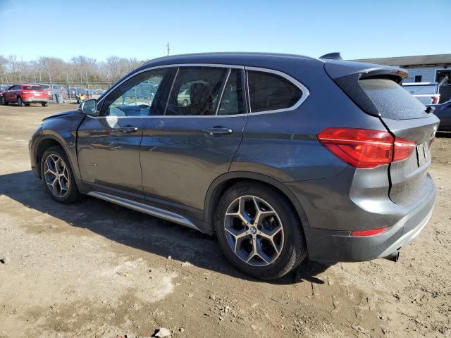 Photo 2 from auction – 2017 BMW X1 XDRIVE2 with VIN WBXHT3C37H5F85357