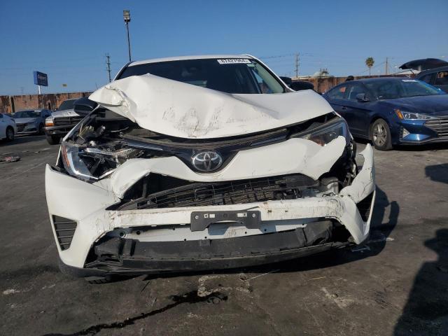 Photo 5 from auction – 2017 TOYOTA RAV4 LE with VIN JTMZFREV2HJ144878