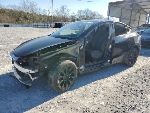 TESLA MODEL Y 2023 with VIN 7SAYGDEEXPA031956 - Photo from auction
