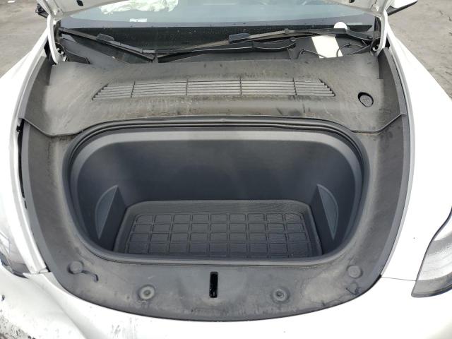Photo 11 from auction – 2023 TESLA MODEL Y with VIN 7SAYGDEE1PA033837