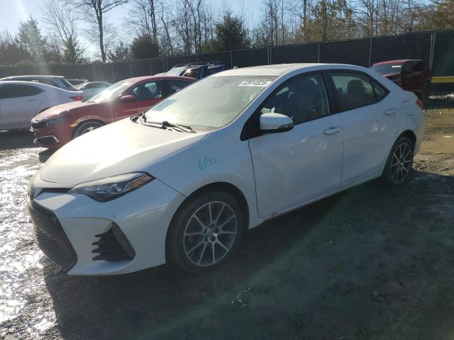 TOYOTA COROLLA L 2017 with VIN 5YFBURHE0HP644469 - Photo from auction