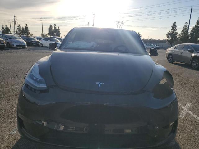Photo 5 from auction – 2023 TESLA MODEL Y with VIN 7SAYGDEF6PF635595