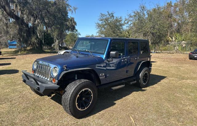 Photo 2 from auction – 2009 JEEP WRANGLER U with VIN 1J4GA39159L744059