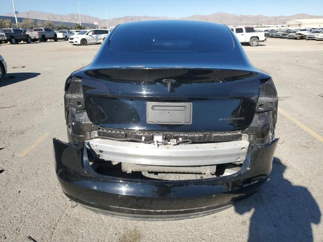 Photo 6 from auction – 2021 TESLA MODEL 3 with VIN 5YJ3E1EBXMF876712