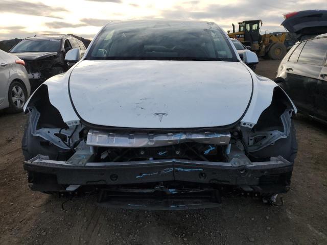 Photo 5 from auction – 2022 TESLA MODEL Y with VIN 7SAYGAEE0NF533812