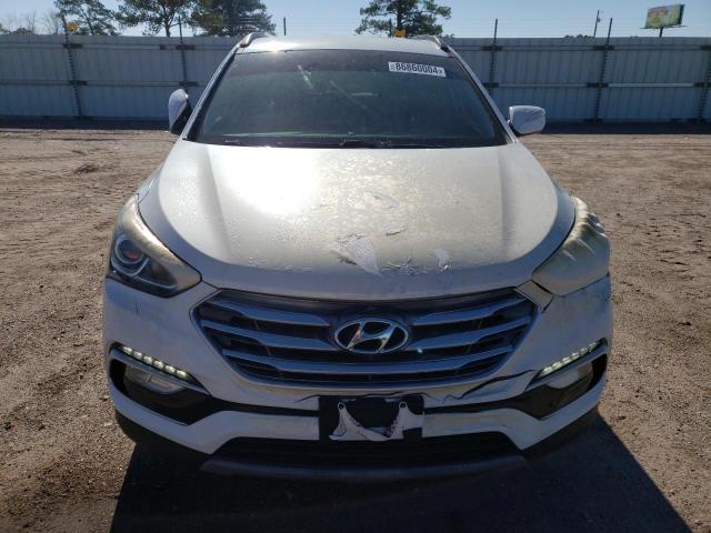 Photo 5 from auction – 2018 HYUNDAI SANTA FE S with VIN 5NMZU3LB7JH095152