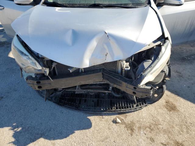 Photo 11 from auction – 2014 TOYOTA COROLLA L with VIN 5YFBURHE2EP103838