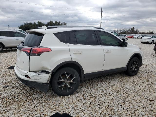 Photo 3 from auction – 2017 TOYOTA RAV4 SE with VIN JTMNFREV8HJ139571