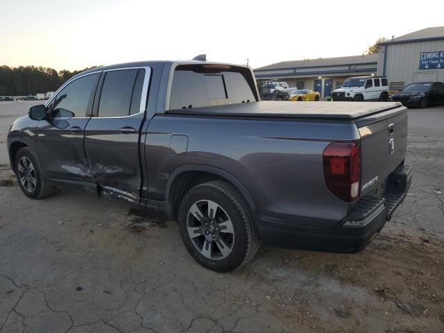 Photo 2 from auction – 2019 HONDA RIDGELINE with VIN 5FPYK2F50KB000989