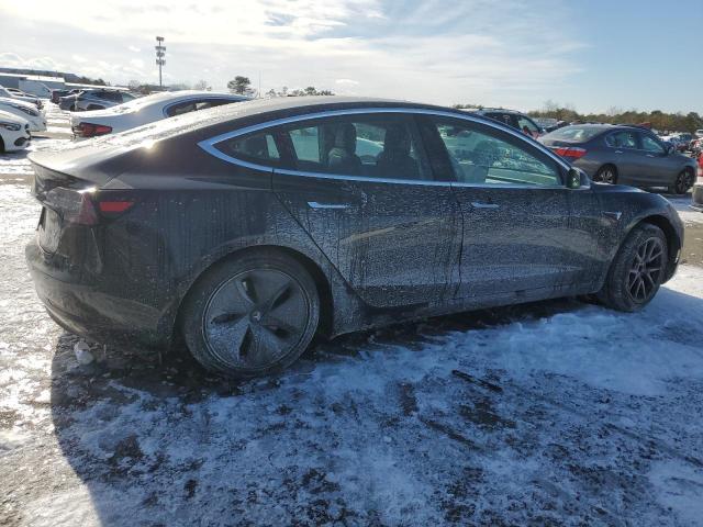 Снимка 3 от търг – 2018 TESLA MODEL 3 с VIN 5YJ3E1EA7JF172857