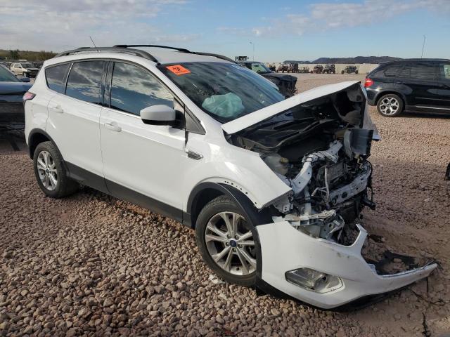 Photo 4 from auction – 2018 FORD ESCAPE with VIN 1FMCU9HD3JUC80404