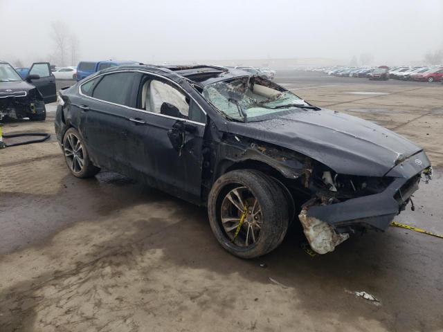 Photo 4 from auction – 2019 FORD FUSION TIT with VIN 3FA6P0D98KR207632
