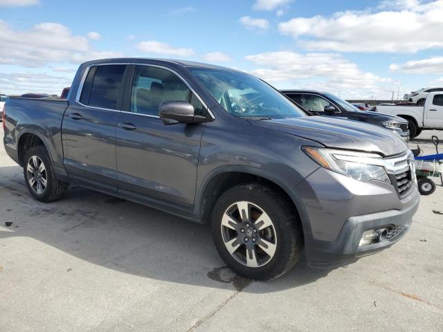 Photo 4 from auction – 2018 HONDA RIDGELINE with VIN 5FPYK3F68JB012305