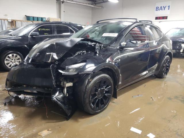 TESLA MODEL Y 2023 with VIN 7SAYGDEE1PF749365 - Photo from auction