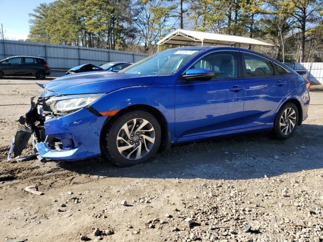 HONDA CIVIC EX 2018 with VIN 2HGFC2F7XJH590045 - Photo from auction