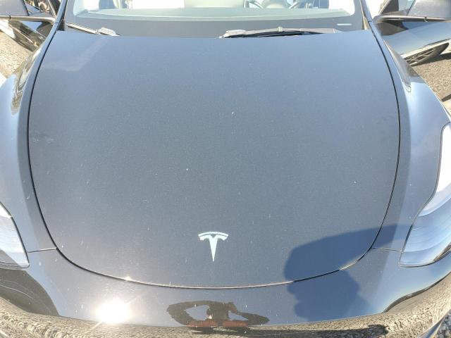 Photo 11 from auction – 2023 TESLA MODEL Y with VIN 7SAYGDEE3PF797238