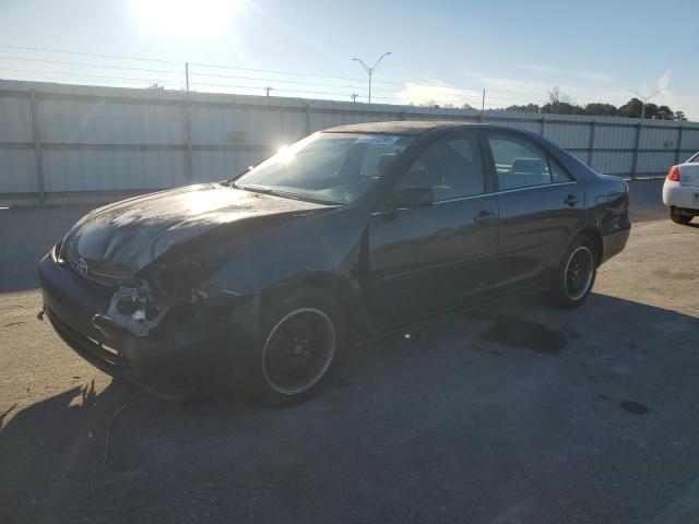 TOYOTA CAMRY LE 2004 with VIN 4T1BE32K74U289205 - Photo from auction