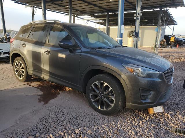 Photo 4 from auction – 2016 MAZDA CX-5 GT with VIN JM3KE2DY9G0640425