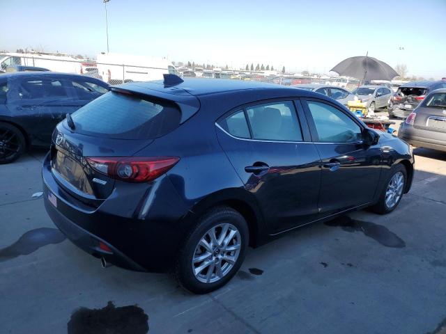 Photo 3 from auction – 2014 MAZDA 3 TOURING with VIN JM1BM1L72E1151435