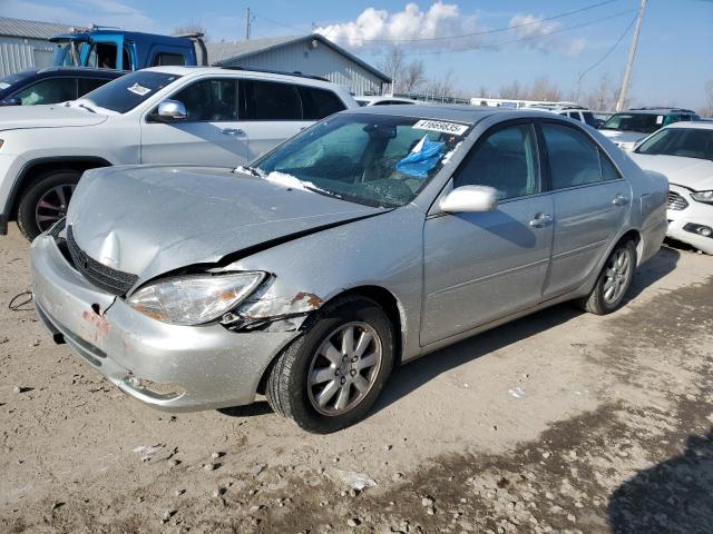 TOYOTA CAMRY LE 2004 with VIN 4T1BE30K34U921409 - Photo from auction