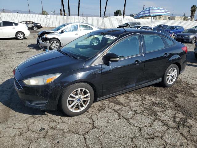 FORD FOCUS SE 2017 with VIN 1FADP3F21HL259183 - Photo from auction