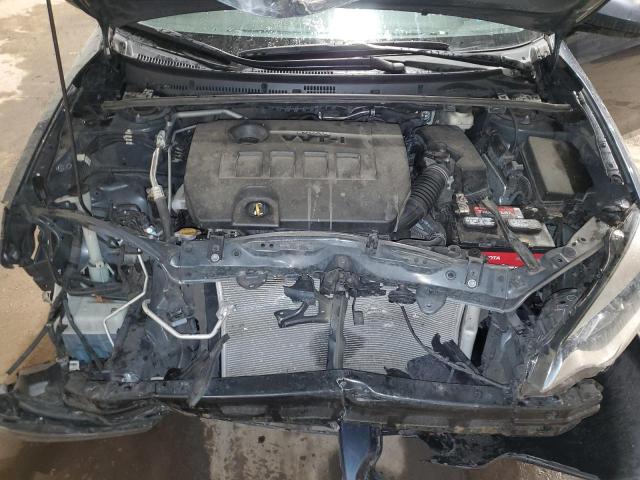 Photo 11 from auction – 2014 TOYOTA COROLLA L with VIN 2T1BURHE4EC117305