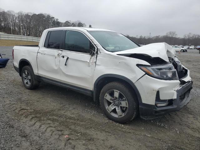 Photo 4 from auction – 2024 HONDA RIDGELINE with VIN 5FPYK3F56RB003816