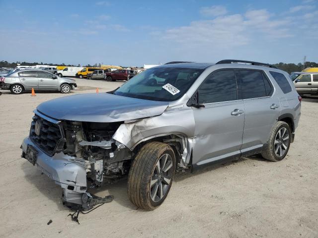 HONDA PILOT TOUR 2023 with VIN 5FNYG2H73PB000923 - Photo from auction