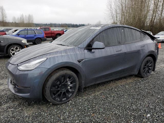 TESLA MODEL Y 2022 with VIN 7SAYGDEEXNA009128 - Photo from auction
