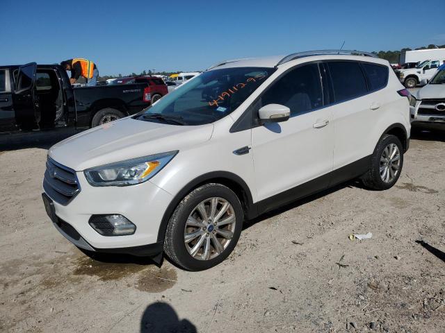 FORD ESCAPE TIT 2017 with VIN 1FMCU0J97HUC55968 - Photo from auction