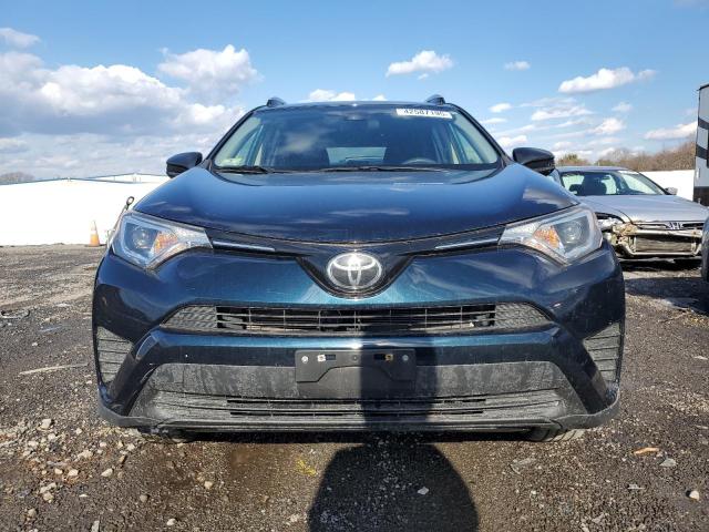 Photo 5 from auction – 2018 TOYOTA RAV4 LE with VIN JTMBFREV0JJ745973