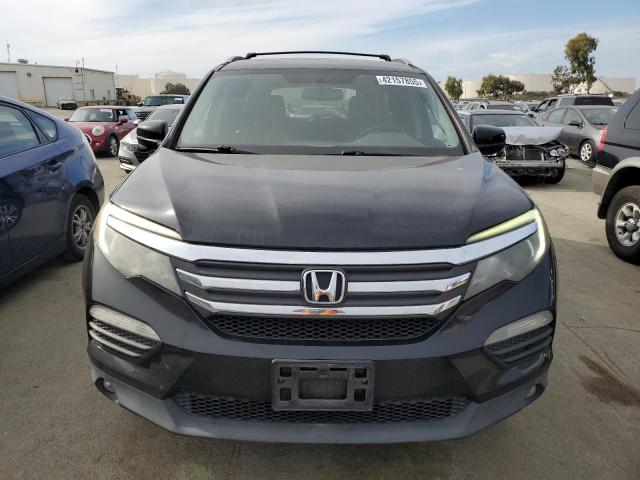 Photo 5 from auction – 2016 HONDA PILOT EXL with VIN 5FNYF6H82GB005369