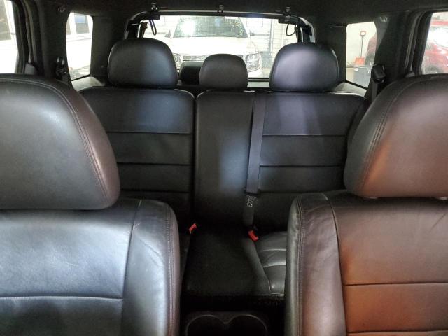 Photo 10 from auction – 2010 FORD ESCAPE LIM with VIN 1FMCU9E74AKA11399