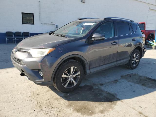 Photo 1 from auction – 2017 TOYOTA RAV4 XLE with VIN 2T3RFREV2HW587548