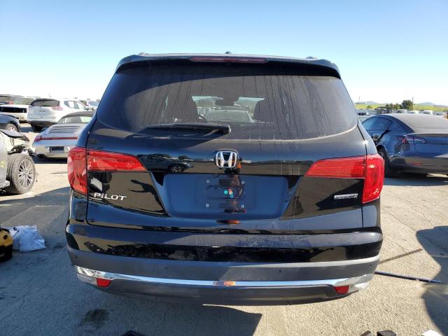 Photo 6 from auction – 2017 HONDA PILOT TOUR with VIN 5FNYF5H95HB010845