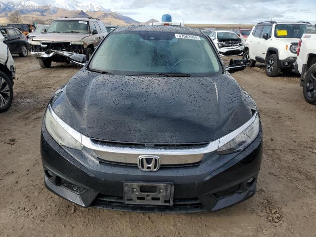 Photo 5 from auction – 2016 HONDA CIVIC TOUR with VIN 2HGFC1F97GH652330