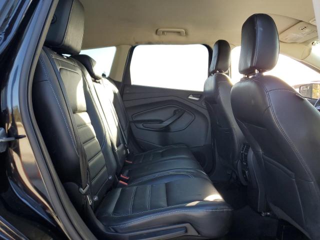 Photo 11 from auction – 2019 FORD ESCAPE TIT with VIN 1FMCU0J94KUC29383