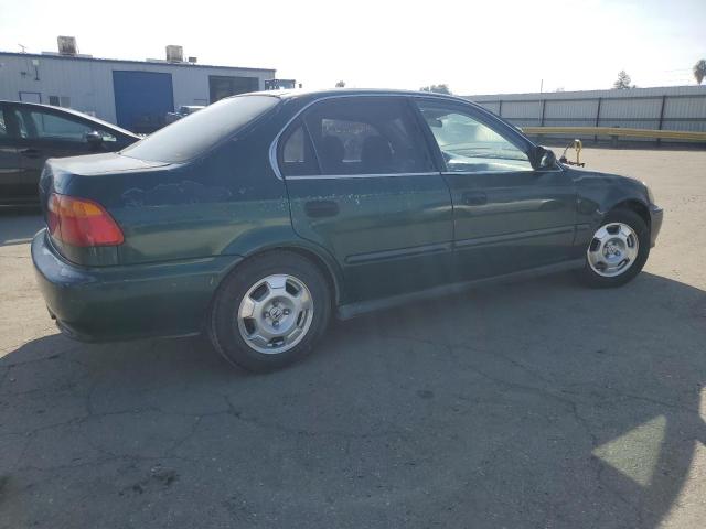 Photo 3 from auction – 2000 HONDA CIVIC with VIN JHMEJ6677YS003793