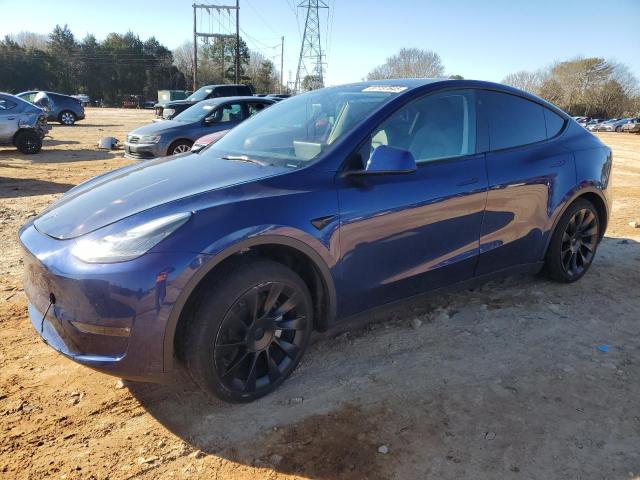 TESLA MODEL Y 2023 with VIN 7SAYGDEE6PA079843 - Photo from auction