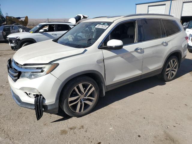 HONDA PILOT 2016 with VIN 5FNYF6H93GB113931 - Photo from auction