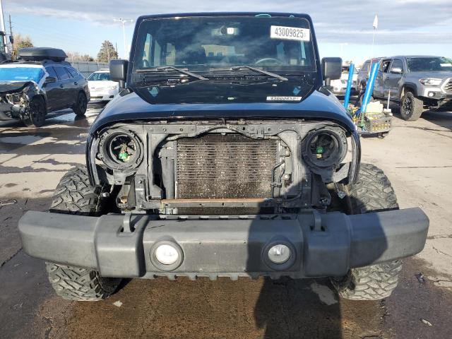 Photo 5 from auction – 2014 JEEP WRANGLER U with VIN 1C4BJWFG8EL166821
