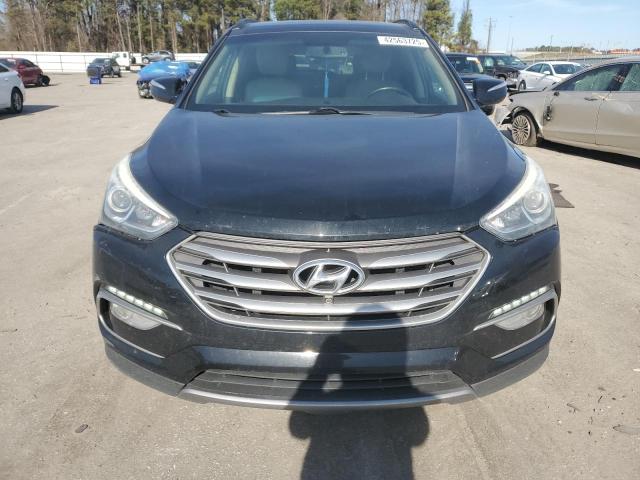 Photo 5 from auction – 2018 HYUNDAI SANTA FE S with VIN 5NMZU3LB5JH057077