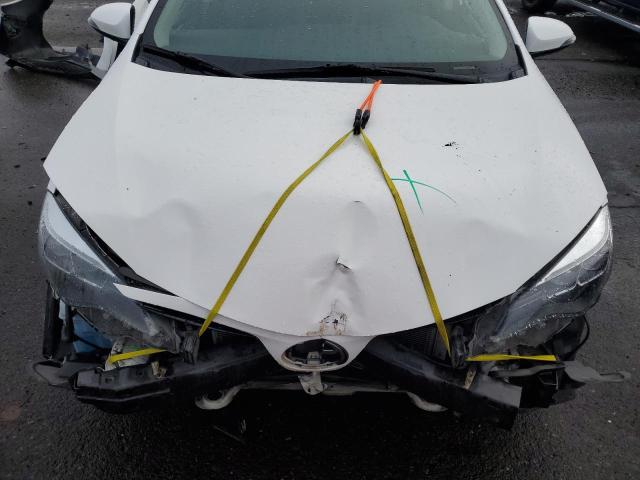 Photo 11 from auction – 2018 TOYOTA COROLLA L with VIN 2T1BURHE2JC107110