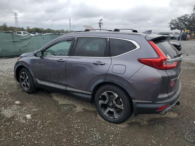 Photo 2 from auction – 2017 HONDA CR-V TOURI with VIN 7FARW1H99HE035362