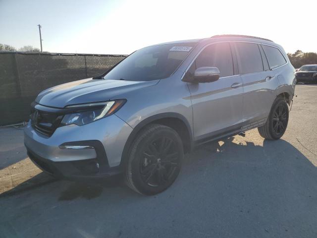 HONDA PILOT SE 2022 with VIN 5FNYF5H2XNB034895 - Photo from auction