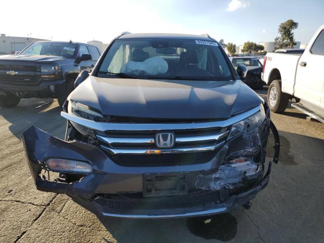Photo 5 from auction – 2017 HONDA PILOT TOUR with VIN 5FNYF6H98HB095119