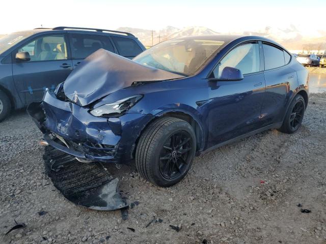 TESLA MODEL Y 2023 with VIN 7SAYGAEE0PF627921 - Photo from auction
