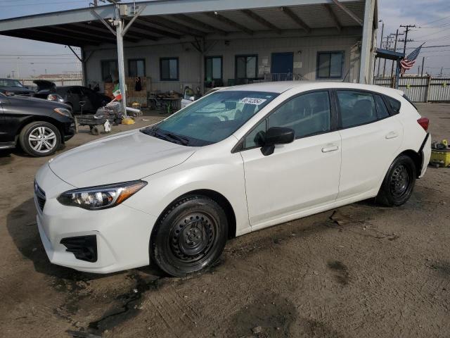 SUBARU IMPREZA 2019 with VIN 4S3GTAA65K3723195 - Photo from auction